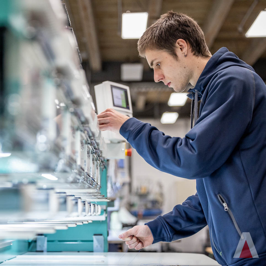 The Art of Embroidery: Elevating Your Brand with Arrow Uniforms